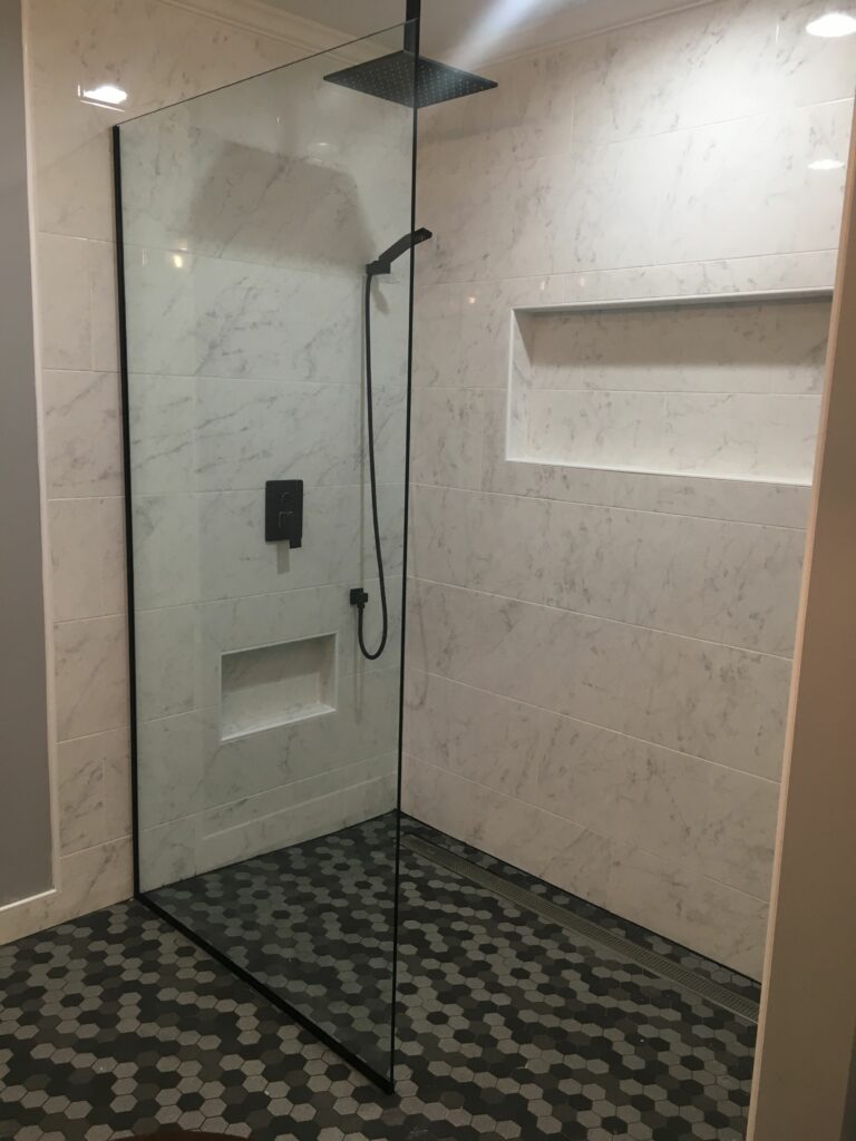 A Marble-Tiled Doorless Shower